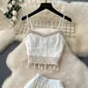Conjunto de Roupa para Primavera 2025: Top Halter Elegante com Bordado de Lantejoulas e Franjas para Mulheres, Saia Evasê de Cintura Alta Emagrecedora