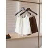 Shorts de linho de cintura alta com cordão, textura relaxada e casual, versátil e ótimo para alongar as pernas, amigável para tipos de corpo pera.