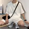 Conjunto Esportivo Casual de Waffle Masculino Moda Verão 2023 Casal Camiseta de Manga Curta Shorts de Manga Curta com Três Listras
