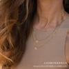 Europeo y Americano en stock transfronterizo 26 letras collar con colgante femenino apilado cadena clavicular chapado 18K cadena de caja joyería de acero de titanio