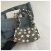 Bolso de axila artístico de nicho estilo coreano con forma de estrella para mujer, nuevo modelo 2026, bolso de hombro único plisado para el día a día con un toque de alta gama y diseño versátil