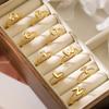 Australia, Europa antigua y Estados Unidos anillo abierto de 26 letras inglesas chapado en cobre simple de oro de 18 quilates anillo joker de nicho femenino