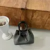 Bolsa tote pequena de alta qualidade, nicho, super popular, essencial para o trabalho, feminina, nova de 2026, outono, de ombro único, transversal, estilo balde