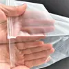 Saco ziplock transparente fosco de PE em estoque com etiqueta de aviso, saco plástico autovedante para meias, armazenamento de roupas e embalagem de vestuário