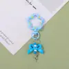 Llaveros Coloridos de Moda con Cuentas Giratorias, Moños Color Caramelo y Dijes de Estrella para Bolsas