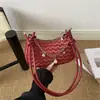 Onda de comércio exterior transfronteiriça texturizada 2026 simples e moderna elegante bolsa de ombro com corrente de bolinho para mulheres