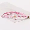Pulsera de flor seca fresca pequeña y dulce Flor de durazno rosa tejida antigua para adulto estudiante mujer puesto puesto suministro