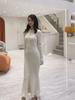 Vestido cheongsam elegante estilo Yujie com cauda de peixe, base interna, suéter justo tipo bainha, vestido de tricô