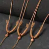 Cordón de hilo encerado envuelto en cuero collar cordón de jadeíta dorada colgante de jade cordón de ámbar thangka accesorios con colgante de piel de tigre cordón para colgar en el cuello