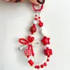 Cadena para teléfono con cara sonriente de dopamina en forma de corazón, pulsera de cuentas con lazo, cadena de muñeca Xiaohongshu, amuleto para bolso, cámara y botella de agua
