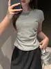 Nova Camiseta Feminina de Verão com Cintura Marcada, Gola Redonda, Ombros Caídos e Manga Curta, Design Único, Estilo Garota Spicy, Emagrecedora, Cor Sólida