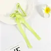 Pinza para el pelo de estilo nuevo transfronteriza, exquisita, estilo dulce, con lazo de cinta, sensación elegante y de alta gama, elegante pinza de tiburón para mujer