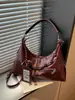 Bolso de axila de diseño de nicho versátil de moda transfronterizo, bolso cruzado de gran capacidad de alta gama, bolso tipo dumpling con bloques de color para commuters