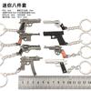 Arma devoradora de pollos periférica mini MK14awm 98K Glock sks rueda izquierda m416 juguete llavero traje