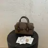 Elegante bolso de bolos de bloques de color de alta calidad para mujer, un bolso de hombro que también se puede llevar cruzado, nuevo bolso tote casual y elegante otoño 2026