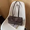 Bolsa Casual Transfronteiriça de Grande Capacidade Feminina Outono 2026 Nova Versátil para o Dia a Dia Simples Bolsa de Ombro Bolsa de Braço