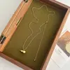 Elegante y Sofisticado Monedero Metálico Colgante de Calabaza Collar, Cadena Larga de Suéter Moderna y Extensible, Estilo Versátil Coreano para Mujer