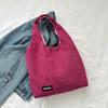 Bolso de lona sencillo de gran capacidad y moda para mujer, nuevo estilo 2023, bolso de pana portátil para hombro y axila.