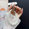Pulseira de celular colorida e estilosa, cordão de pulso, alça de mão curta multifuncional, pingente de chaveiro, nova pulseira de celular
