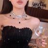 Collar de diamantes exagerado de alta gama para mujer, diseño nicho de lujo ligero, negro, borla para cena, cadena para clavícula, collar