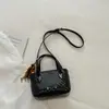 Bolso de mano de moda para el trabajo estilo coreano 2026 verano nuevo bolso cruzado de moda color liso simple nicho bolso de hombro