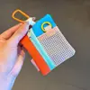 Nuevo cordón de teléfono colorido, charm para bolso, caja de sobre rojo, accesorio para teléfono, llavero, bolsa versátil para auriculares, colgante de bolso pequeño