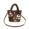 Bolsa de balde xadrez de lã para mulheres, novo estilo popular outono e inverno nicho para o dia a dia bolsa de ombro única transversal