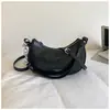 Venta al por mayor transfronteriza de bolsos de axila para mujer de estilo vintage nuevo, bolsos tipo dumpling modernos y elegantes para salir, bolsos de mano, de hombro y cruzados
