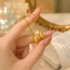 Artículo Caliente de Douyin Tienda de Oro Mismo Estilo Tienen Arroz Cara Sonriente Collar Colgante de Grano de Arroz Divertido Lindo Atrae Riqueza Collar para Clavícula Venta al por Mayor
