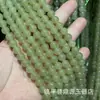 Jade Hetian de imitación, cuentas sueltas de color verde lago de agua clara al por mayor, material Qinghai de imitación, cuentas redondas de material de azúcar color rosa raíz de loto, accesorios de color azul agua jadeíta
