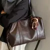 Bolsa Tote de Design da Moda para Mulheres 2025 Nova Retro Versátil Grande Capacidade Ombro Transversal Transfronteiriça