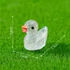 Miniaturas adoráveis e brilhantes de patinhos amarelos - perfeitas para decorações DIY e como pequenos enfeites de mesa