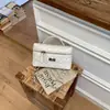 Bolso de mano de cadena de alta gama con patrón de diamante para mujer, nuevo y elegante bolso cuadrado pequeño para el día a día 2026, bolso de hombro y cruzado único y versátil