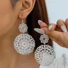 Pendientes Retro Europeos y Americanos con Borlas en Forma de U para Mujer ebay Estilo Étnico Pieza Redonda Media Luna Hueca Pendientes Largos Colgantes de Oreja