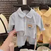 Conjunto de pijama cepillado para niños, nueva colección otoño 2026, manga larga, diseño de cuadros de dibujos animados, unisex, con cuello camisero, adecuado para ropa de casa