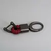 Chaveiro Personalizado de Carro Transfronteiriço Chaveiro de Corda de Couro Trançado à Mão Chaveiro de Liga de Zinco com Gravação para Homens Criação