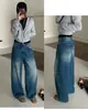 Novedades de otoño: Jeans Curvos de Bolsillo Grande Lavado Pesado de Doble Botón Estilo Europeo Guangzhou Trece Líneas 82612