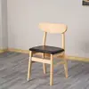 Sillas de comedor de madera maciza estilo nórdico con respaldo de mariposa, diseño simple y moderno, adecuadas para uso doméstico, restaurantes y entornos de comedor informal.; disponible para venta al por mayor