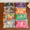 100 Piezas Gomas para el Cabello de Margarita Sencillas Empaquetadas en Bolsa Bandas de Goma de Nylon Coloridas Anillos de Toalla Accesorios de Cabello de Moda Cuerdas para el Cabello Lote