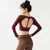 Top de yoga de una pieza para mujer, acolchado, sin espalda, de manga larga, con diseño hueco, doble tirante fino, orificios para el pulgar y característica de secado rápido para entrenamiento físico