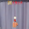 Talla de Madera de Palo de Rosa Creativa DIY Grabado Cadena para Teléfono Móvil Colgante Yiming Xianyuan Colgante Creativo Joyería Colgante