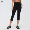 Calça de Yoga Feminina Cropped de Cintura Alta Sem Costuras Estranhas, Efeito Levanta Bumbum Pêssego, Justa ao Corpo, Adequada para Corrida ao Ar Livre e Fitness D26102