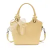 2026 Nueva Moda Bolso Cubo para Mujer Simple de un Solo Hombro Cruzado Versátil para Viajes Diarios Portátil Pequeño Todo Uso Textura de Cuero Suave