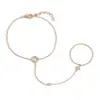 Elegante pulsera y anillo de trébol de cuatro hojas con diamantes estilo francés, exquisito accesorio de mano versátil y elegante para mujer