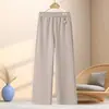 Calça da mamãe, coleção de outono, cintura elástica, calça pantalona, novo estilo 2026, calça reta outono/inverno, calça estilosa e casual para mulheres de meia-idade e idosas