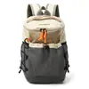 Mochila Grande de Grande Capacidade Estilo Coreano Transfronteiriça para Homens e Mulheres Novo Modelo 2026 Spliced Bolsa Esportiva para Montanhismo ao Ar Livre