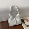 Bolsa de Axila Estilo Coreano de Nicho para Mulheres 2026 Nova Versátil Bolsa de Ombro de Mão com Toque de Luxo, para o Dia a Dia Casual, Cor Sólida e Design Elegante