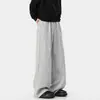 Calça de moletom cinza com fenda e perna larga para homens, cintura alta com costura diagonal, solta e fluida, calça casual de comprimento total com um toque relaxado de estilo de rua