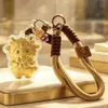 Venta Caliente Año del Cordero Tener Dinero para Gastar Llavero Dorado Oro Puro 999 Correa para Teléfono Colgante de Bolso Empaque de Caja de Regalo Regalo para Conducir