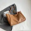 Bolso de hombro para mujer Shuai Mi Jia 2026 otoño nuevo, color liso, gran capacidad, bolso tote, bolso de mano elegante y texturizado